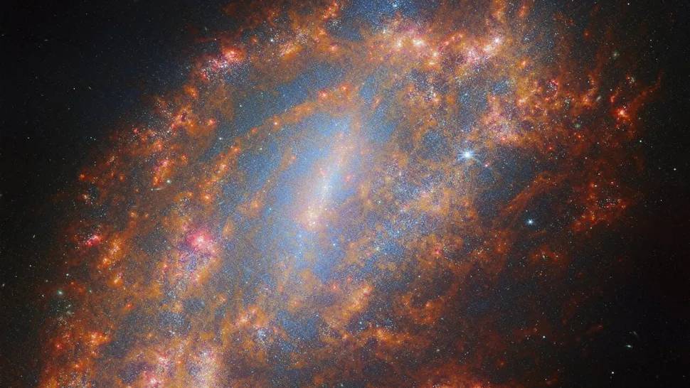 Telescopul James Webb Surprinde Imagini in Premiera cu o Galaxie Indepartata galaxie spirala