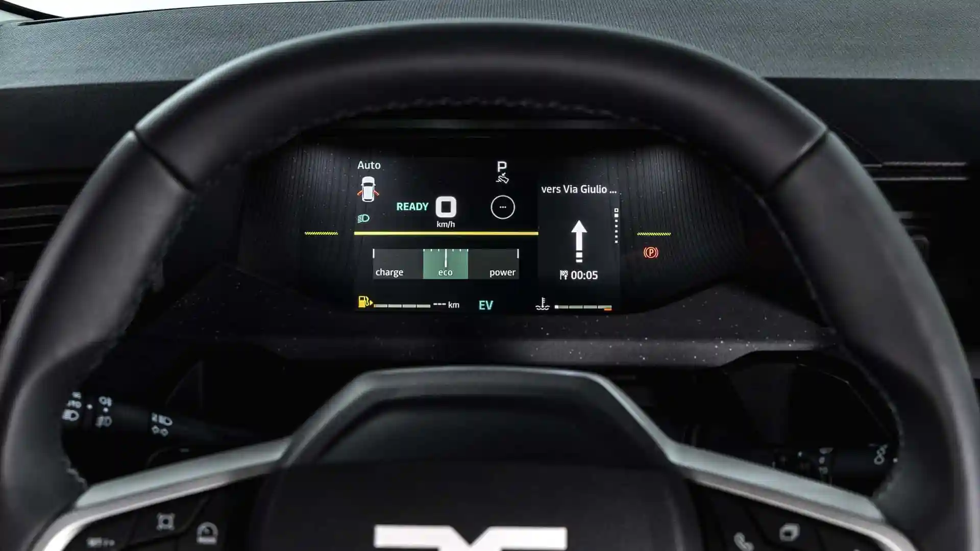 Interiorul DACIA Striker 2026 bord volan | iDevice.ro Interiorul DACIA Striker 2026 bord volan