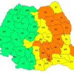 harta cod portocaliu ploi torentiale, vant, vijelie, grindina, atentionare meteo Romania 20 iulie 2026 Color-coded map of Romania's counties with abbreviations (e.g., BN, BV, BH); green western regions, yellow central, orange eastern regions.