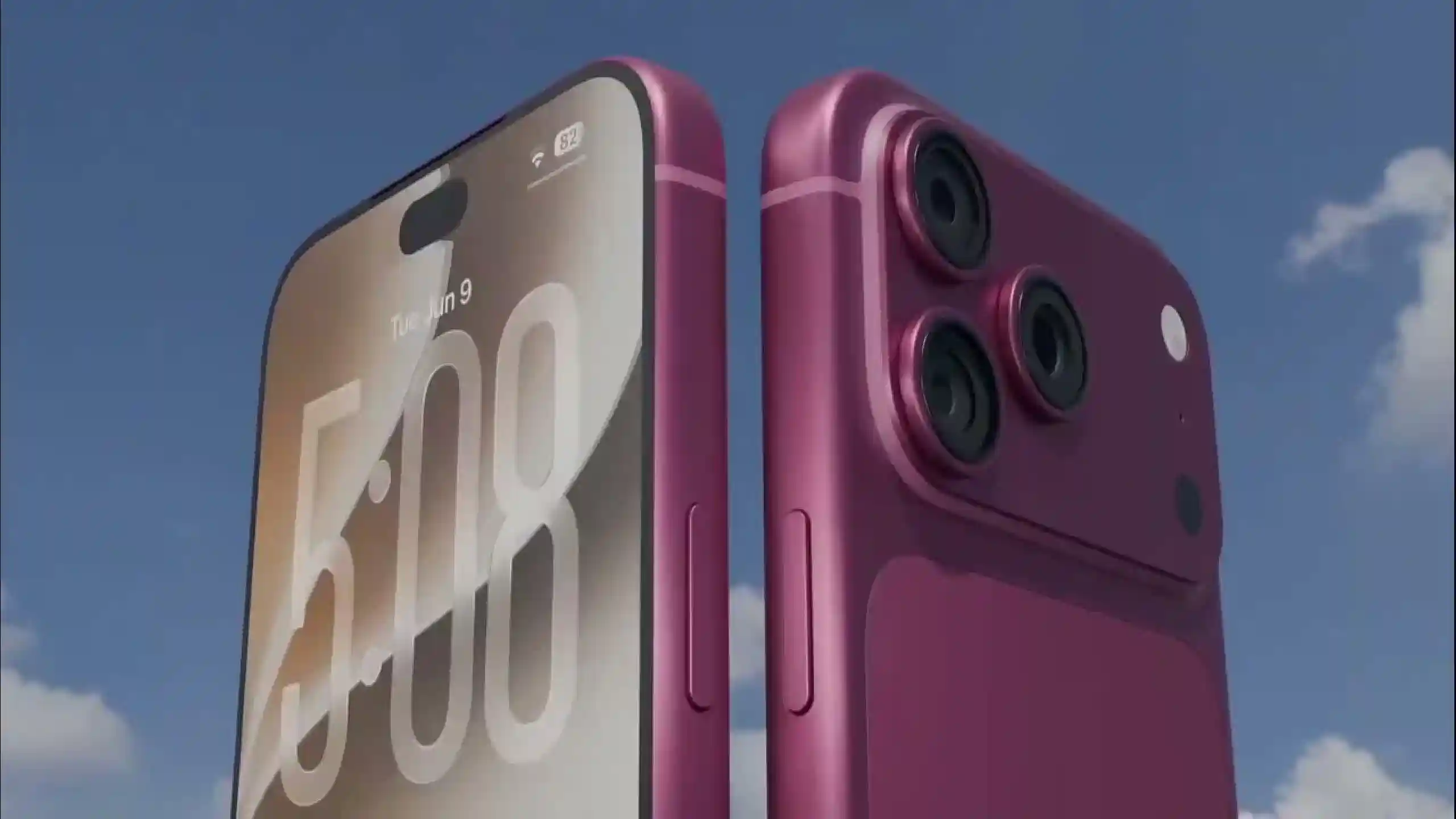 iPhone 18 limitari | iDevice.ro Close-up of a pink iPhone showing its triple-camera rear array against a clear blue sky, outdoors.