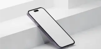 Product render of a slim white smartphone with black border and purple edge, resting diagonally on a pale stepped surface.