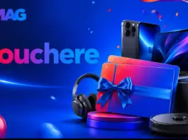 Blue promotional banner with gadgets (laptop, headphones) and a gift box with blue ribbon, suggesting vouchers and prizes from eMAG.
