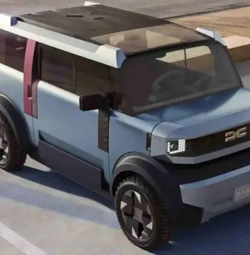 Cred ca DACIA Hipster va avea Probleme Uriase din Cauza BYD Racco la Lansare Futuristic blue SUV concept parked in a street lot with scissor-like doors open and a glass roof showing a modern interior.