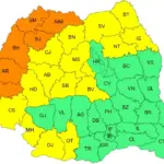 harta meteo cod portocaliu canicula emisa de ANM pentru vestul Romaniei pe 1 august 2026 | iDevice.ro Color-coded map of Romania's counties by region: orange in the west, yellow in central/northern areas, green in the southeast and south, with each county labeled by its initials (e.g., AR, BH, CL).